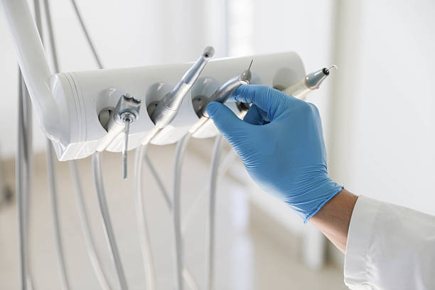 Professional Tooth Extraction technician working in Center, TX